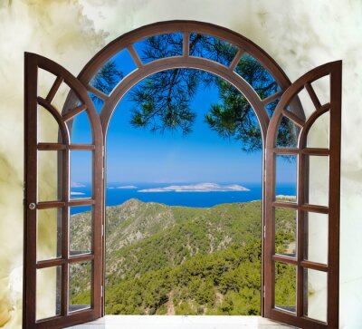 Fotobehang natuur landschap met een uitzicht door een raam met gordijnen