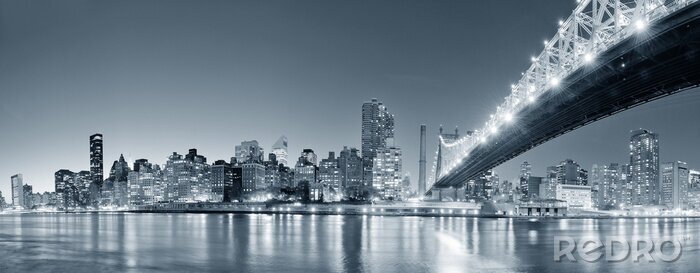 Fotobehang New York City skyline 's nachts