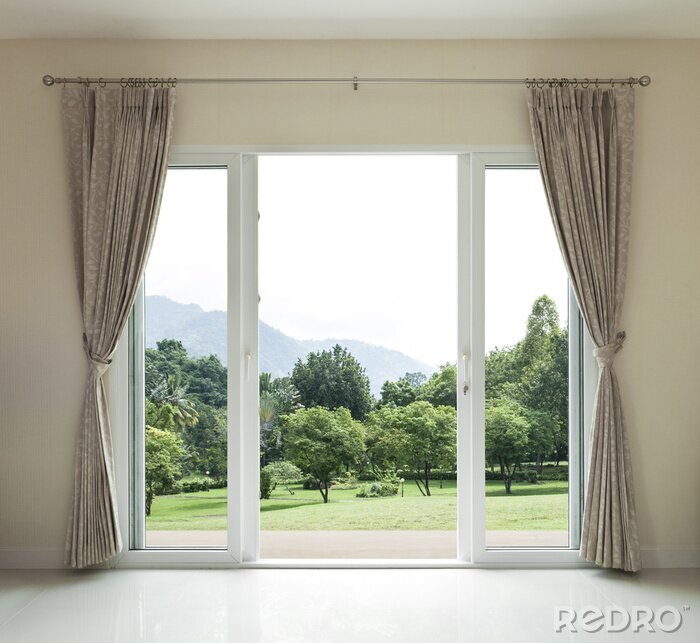 Fotobehang Open deur met uitzicht op het groen