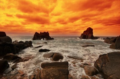 Fotobehang Oranje lucht boven de zee