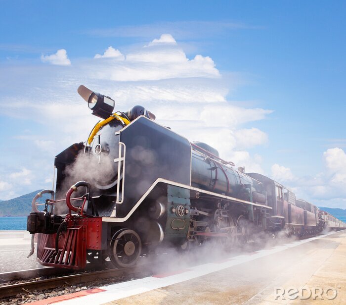 Fotobehang Originele trein in een prachtig landschap