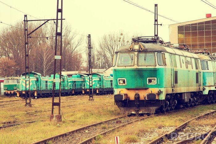 Fotobehang Oude groene treinen