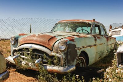 Fotobehang oude roestige auto