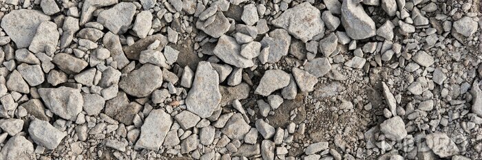 Fotobehang Panoramic image. Gray gravel stones for the underground in road construction