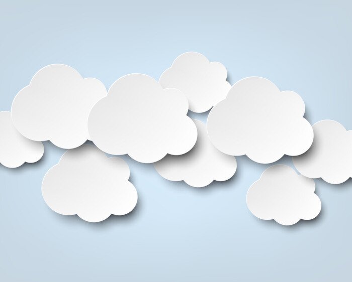 Fotobehang Papieren wolken op een blauwe achtergrond