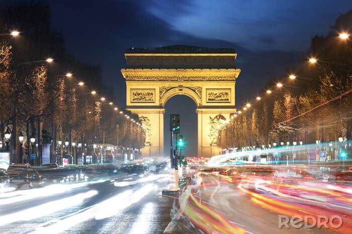 Fotobehang Parijs bij nacht en de Arc de Triomphe