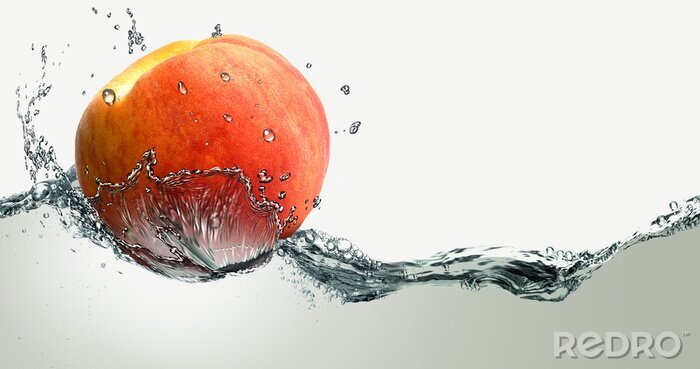 Fotobehang Perzik fruit op water