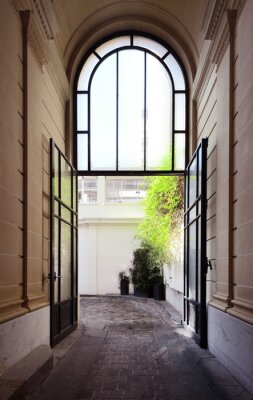 Fotobehang Porte d'atelier en verre et Ferronnerie