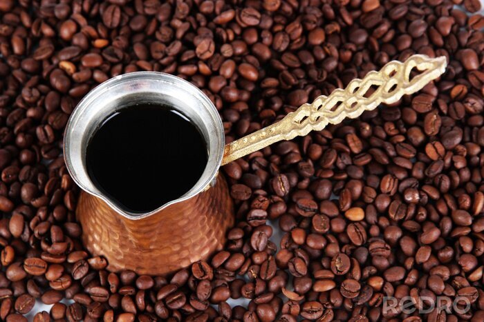 Fotobehang Pot koffie en gestrooide koffiebonen