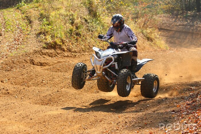 Fotobehang Quad motorrijder springt