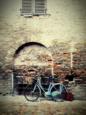 Fotobehang Retro fiets bij de muur