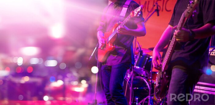 Fotobehang Rock gitarist met rode gitaar