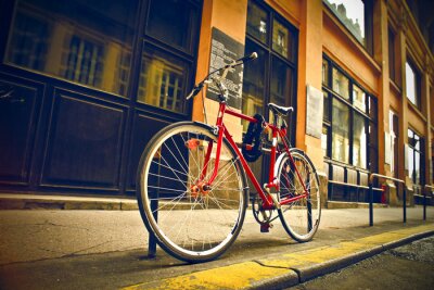 Fotobehang rode fiets op straat