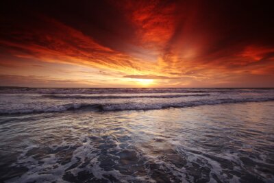 Fotobehang Rode zonsondergang boven de zee