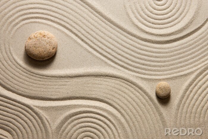 Fotobehang Ronde stenen op een zand