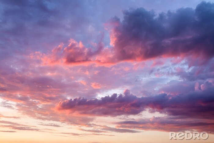 Fotobehang Roze en paarse wolken