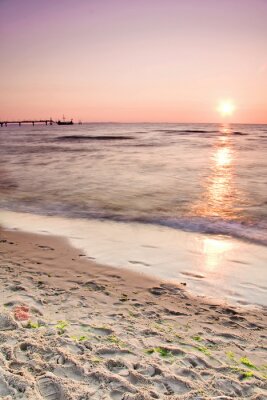 Fotobehang Roze zonsondergang aan zee