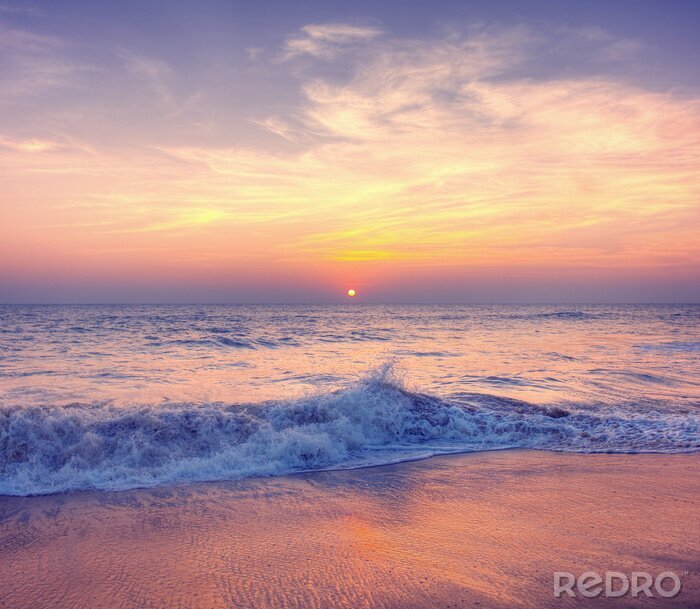 Fotobehang Roze zonsondergang over de zee