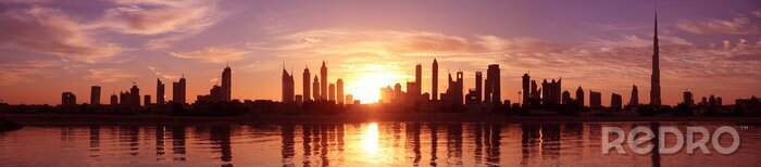 Fotobehang Skyline van Dubai met paarse lucht