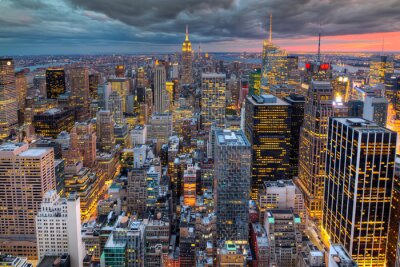 Fotobehang skyline van New York bij ondergaande zon