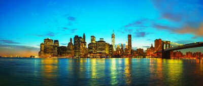 Fotobehang skyline van New York City bij zonsondergang