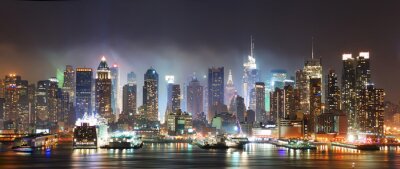 Fotobehang Skyline van verlichte gebouwen bij nacht