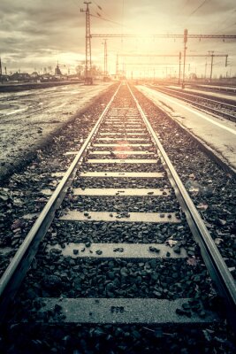 Fotobehang Sporen zonder treinen in de zon