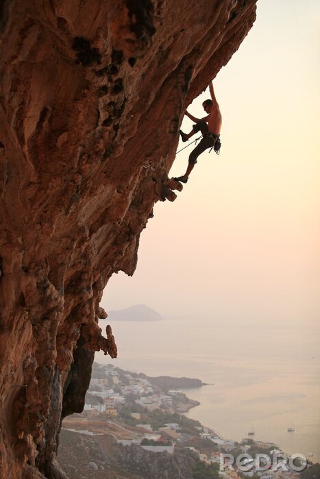 Fotobehang Sport op hoge rotsen