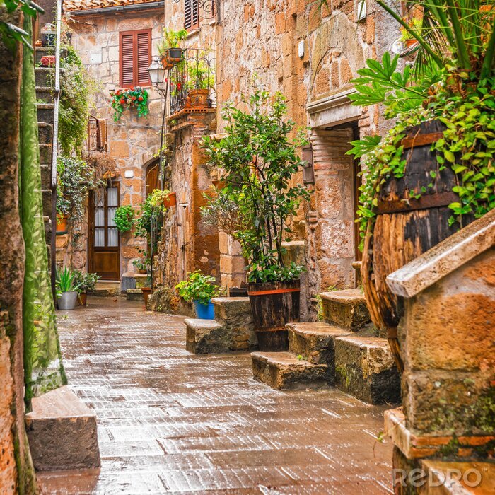 Fotobehang Steegje in de oude binnenstad van Pitigliano Toscane