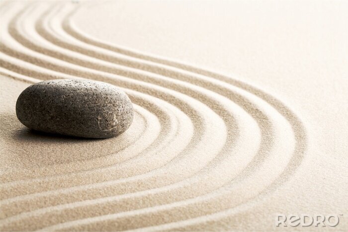 Fotobehang Steen op een achtergrond van zand