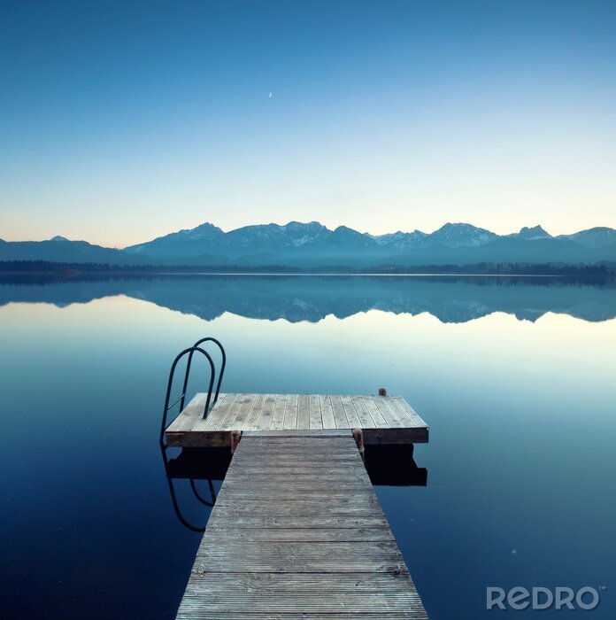 Fotobehang Steiger met de Alpen op de achtergrond