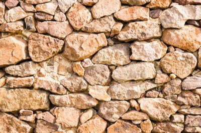 Fotobehang Stenen muur van onregelmatige stenen