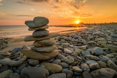 Fotobehang Stenen op een strand
