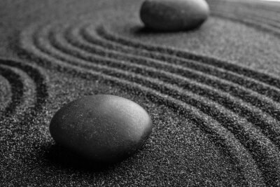 Fotobehang Stenen op zwart zand