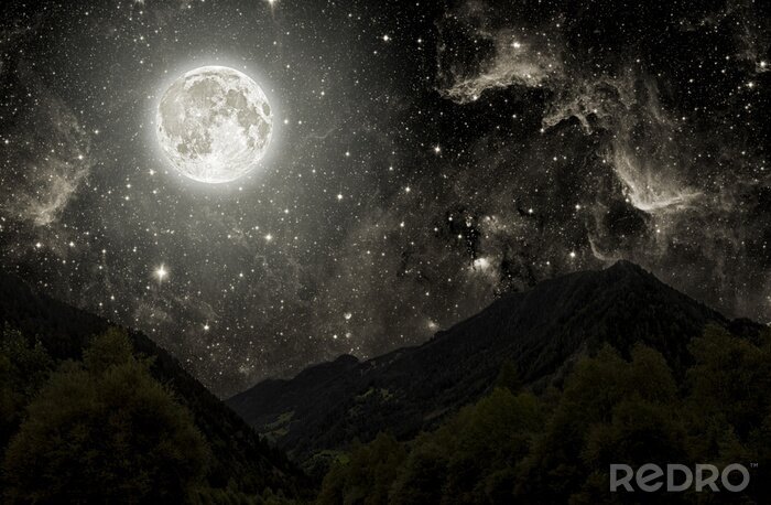 Fotobehang Sterrenhemel 's nachts boven een bergketen