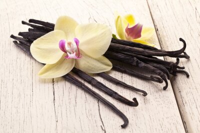 Fotobehang Stokjes vanille en bloemen
