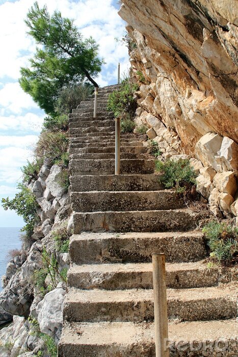 Fotobehang Stone staircase on the edge of the cliff