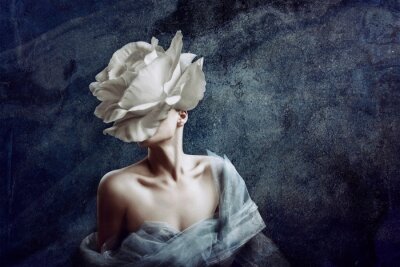 Strange fine art concept. The body of a woman, her head is a rose.