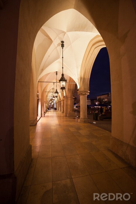Fotobehang Sukiennice in Krakau bij nacht