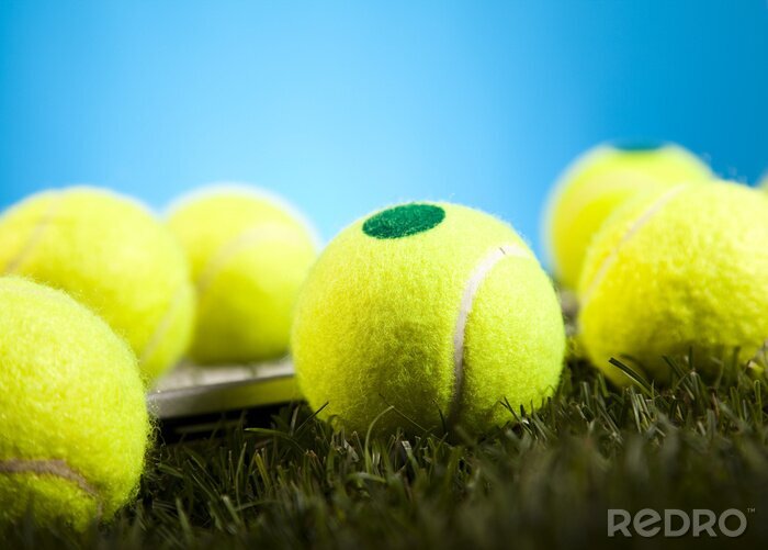 Fotobehang Tennisballen op gras