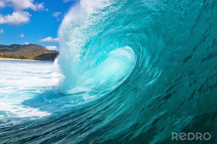 Fotobehang Turquoise golf op de zee