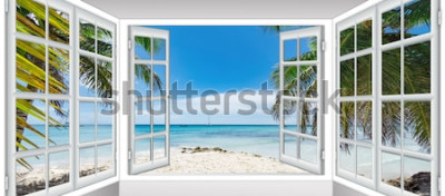 Fotobehang Uitzicht op zee en palmbomen vanaf het glazen terras