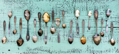 Fotobehang Vintage lepels op turquoise hout