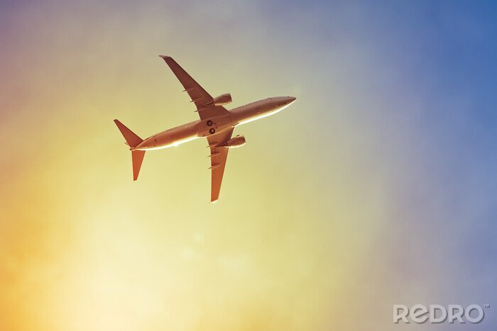 Fotobehang Vliegtuig zonsondergang
