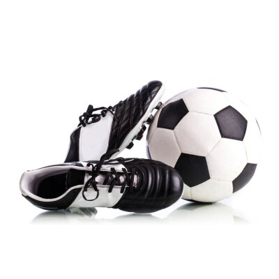 Fotobehang Voetbal en voetbalschoenen