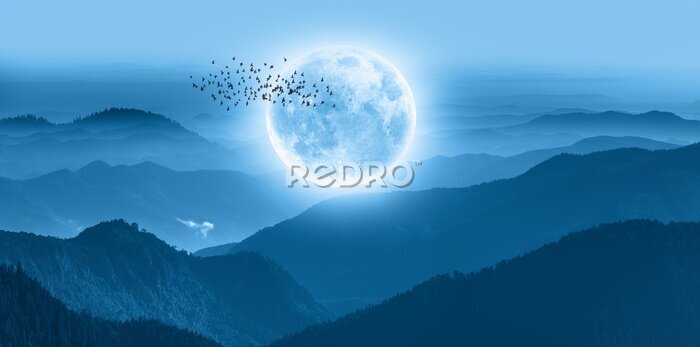 Fotobehang Volle maan boven berglandschap