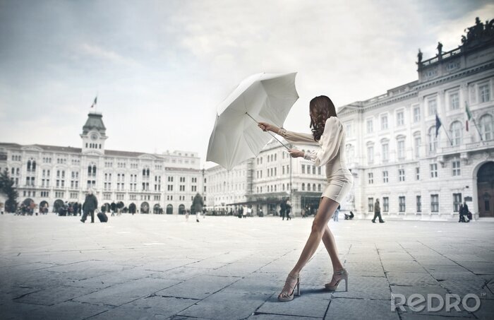 Fotobehang Vrouw met een paraplu