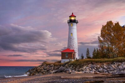 Fotobehang Vuurtoren bij zonsondergang