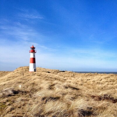 Fotobehang Vuurtoren op de Noordzee