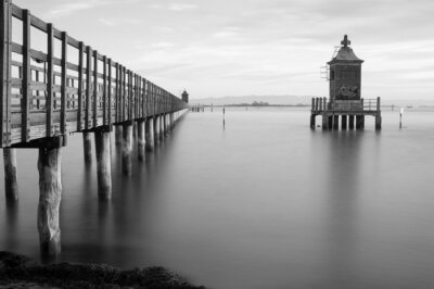 Fotobehang Vuurtoren op een houten pier